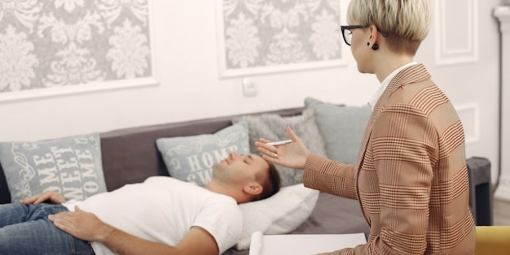 A calm, softly lit room arranged for therapy